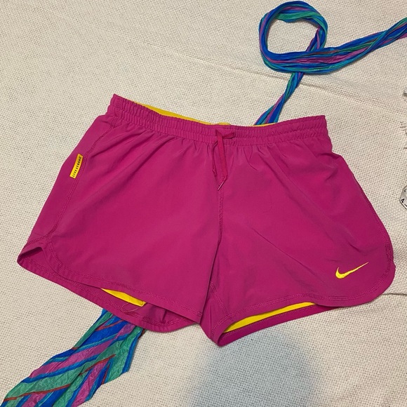 Nike Livestrong Dri-Fit athletic shorts, pink with yellow lining - Picture 1 of 2